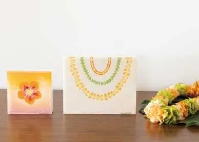 「アンナグレースジュエリー」ネックレス(ピカケ)59,400円、ピアス(ピカケ)8,910円 ◎祝祭広場
「アナ・ルシア・ガルデアサバル」のアートパネル